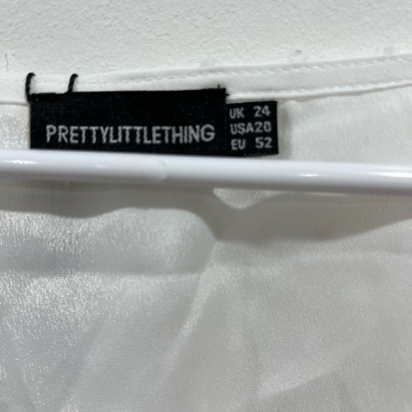Pretty little things white top size 24
G-2 - Picture 3 of 7